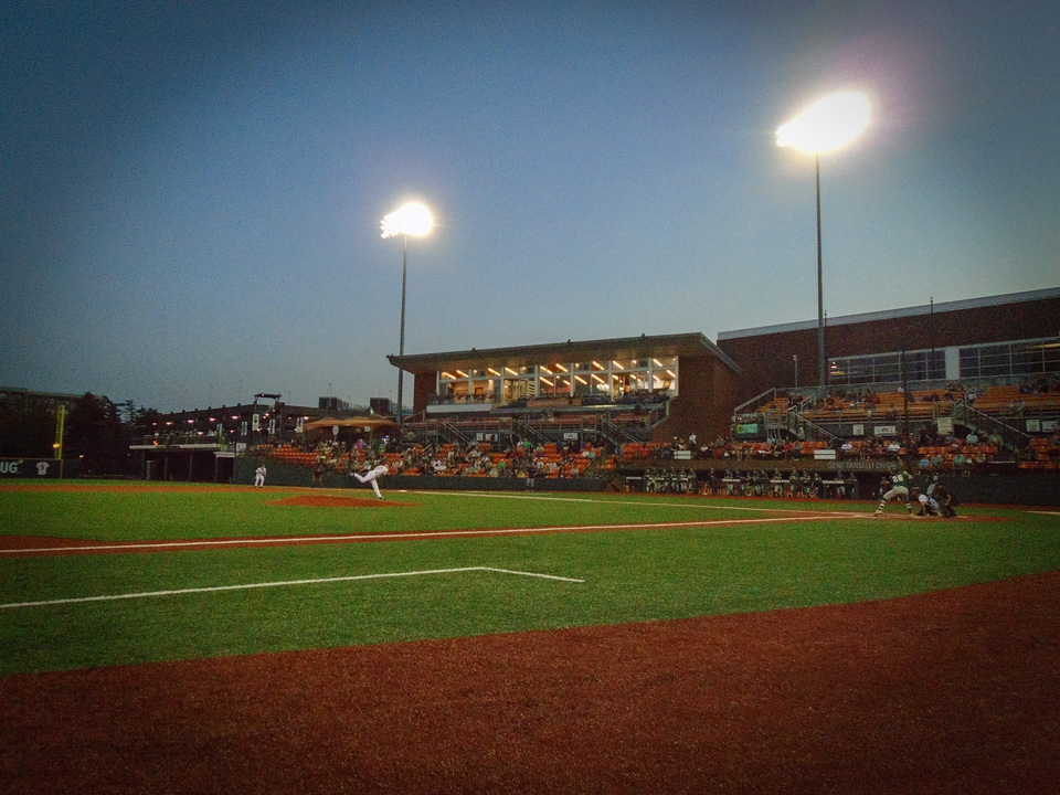Under the lights and a darkening sky over Goss Stadium at Coleman Field, the Knights pitcher delivers the penultimate pitch in the July 26 5-3 win over the Pickles.